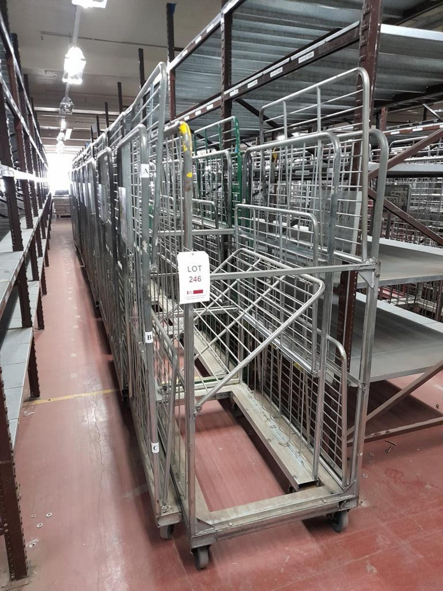 17 - Three shelf wheeled cages, as lotted