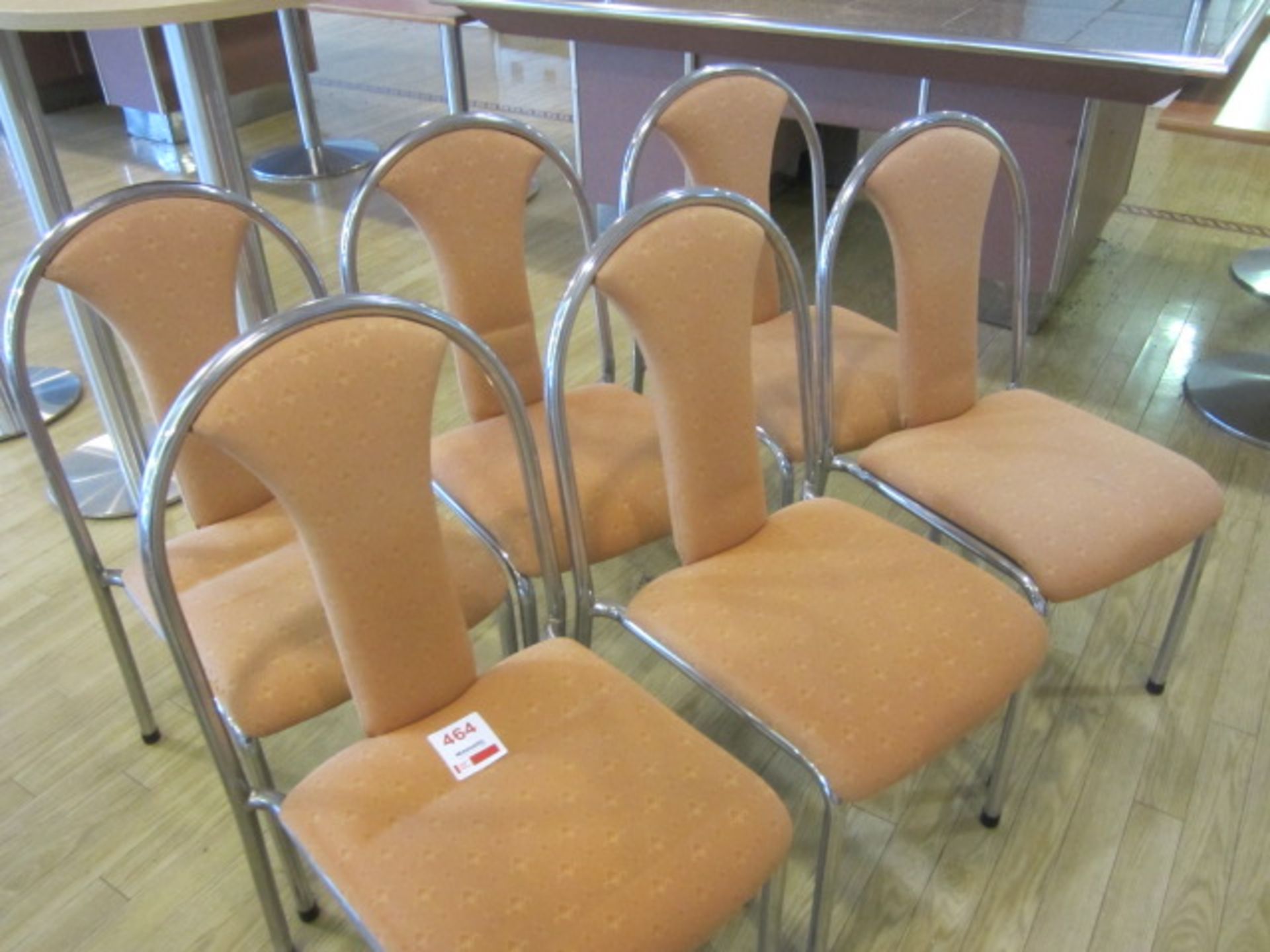 Eight chrome frame upholstered seat/back stacking canteen chairs