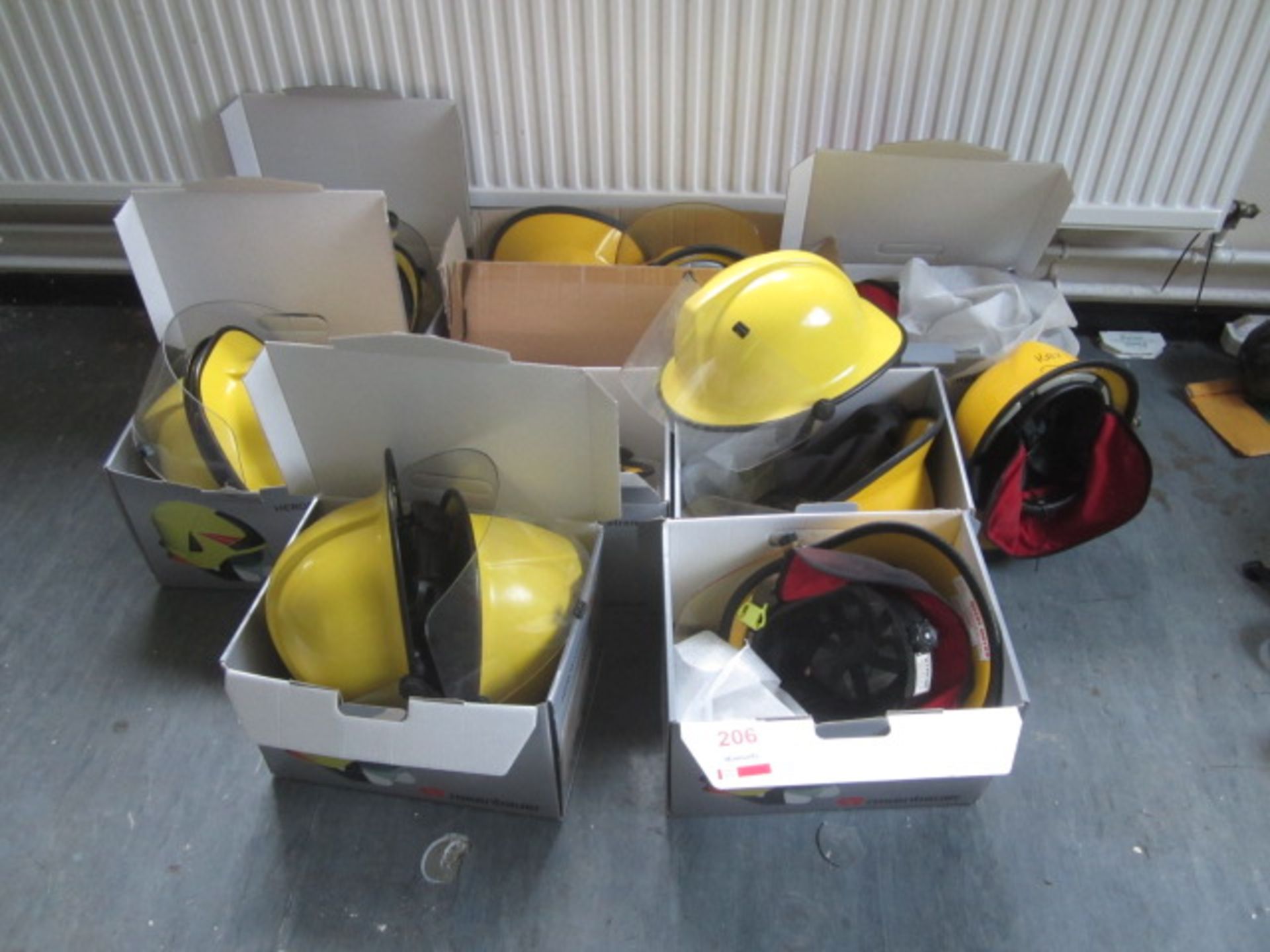 Sixteen fire operative helmets