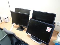 Four various LCD monitors