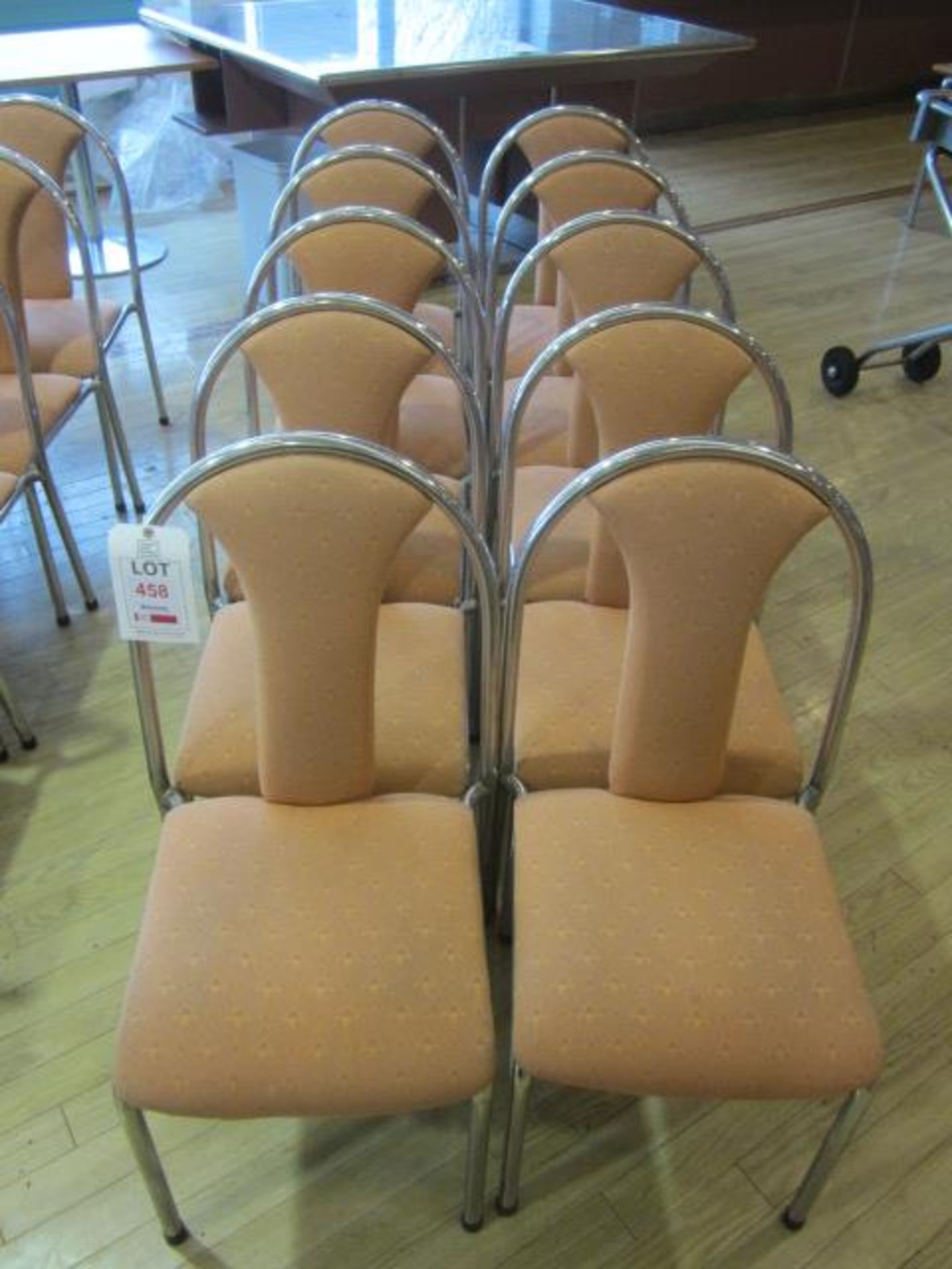 Ten chrome frame upholstered seat/back stacking canteen chairs