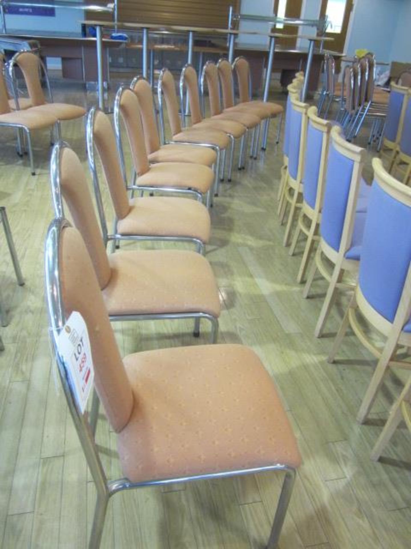 Ten chrome frame upholstered seat/back stacking canteen chairs