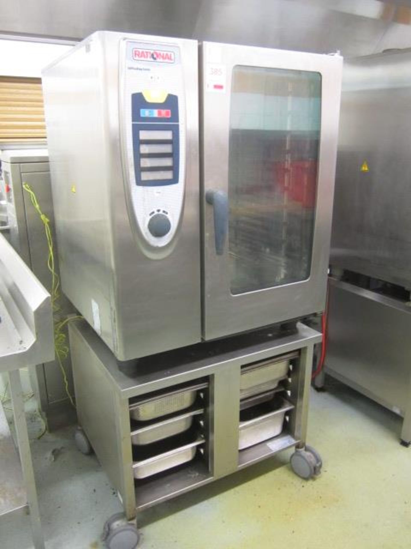 Rational stainless steel shelf cooker centre, model SC101, serial no. AC400/50-60, mounted on