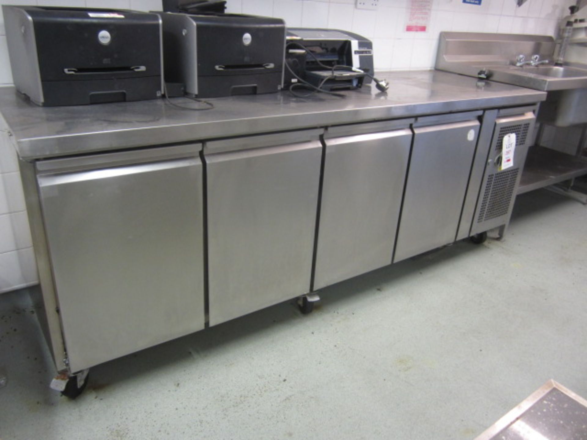 Unbadged stainless steel 4 door refrigerator with preparation worktop, 2230mm x 700mm x H850mm