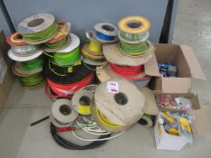 Quantity of assorted reels of electrical cable, bulbs, cable fixings, etc.