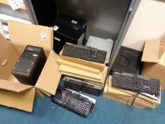 Three desktop PC towers (out of commission) and various keyboards