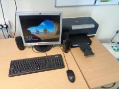 Two Acer desktop PCs, HP desktop PC, three LCD monitors, HP laserjet 4050 printer, HP Officejet