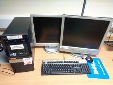 HP Compaq desktop and two LCD monitors