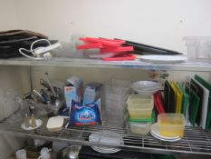 Contents of two bays of racks including chopping boards, plastic trays, plastic cutlery, bag sealer,