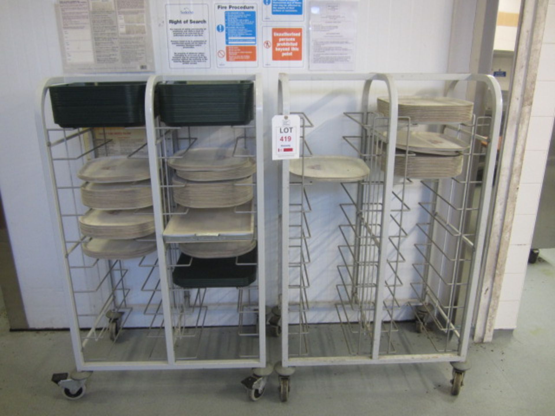 Two multi shelf mobile tray trollies with assorted trays