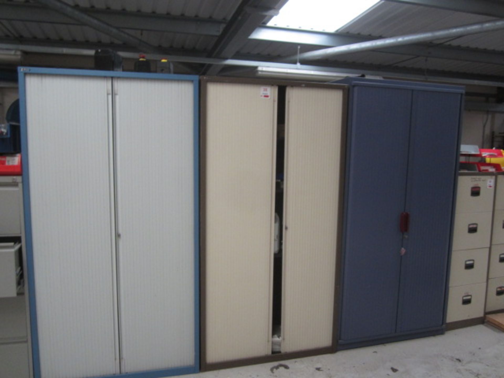 Five assorted sliding door storage filing cabinets