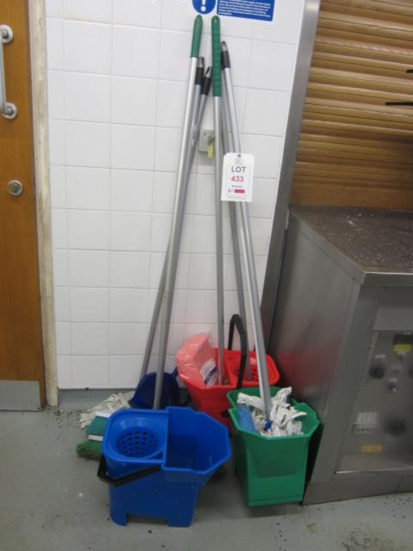 Three assorted mop buckets, mops, brushes, etc.