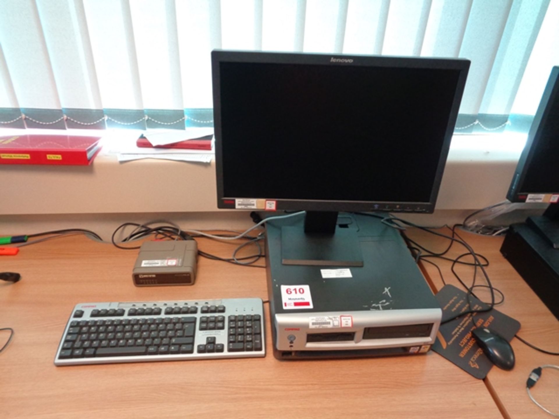 Compaq desktop PC, Lenovo flat screen monitor, keyboard, mouse