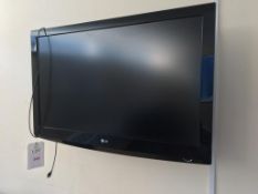LG 42LG3000 television with wall mount bracket and remote