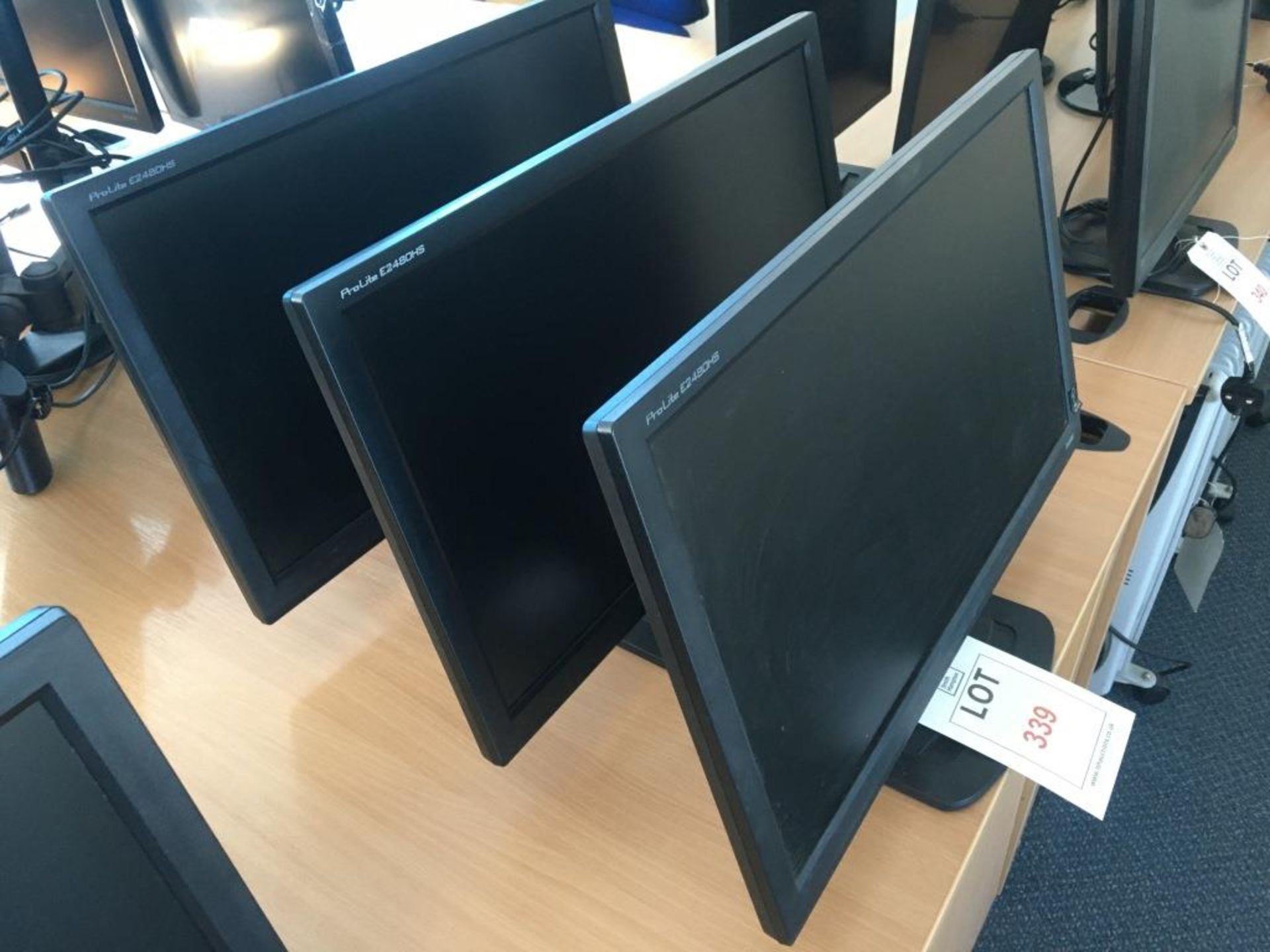 Three iiyana Prolite E2480HS computer monitors