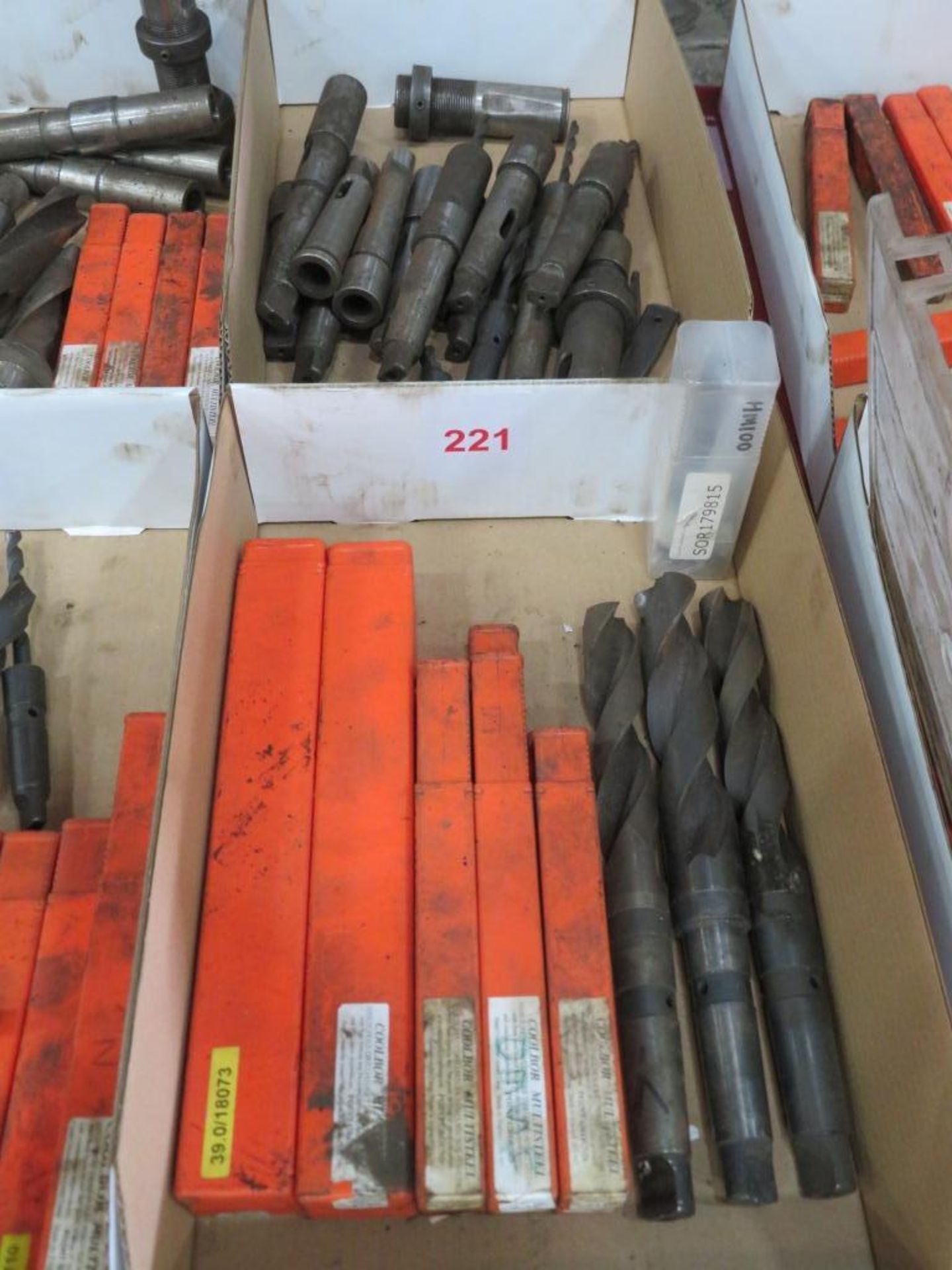 Drill bits in two tote bins