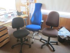 Three assorted cloth upholstered swivel office chairs