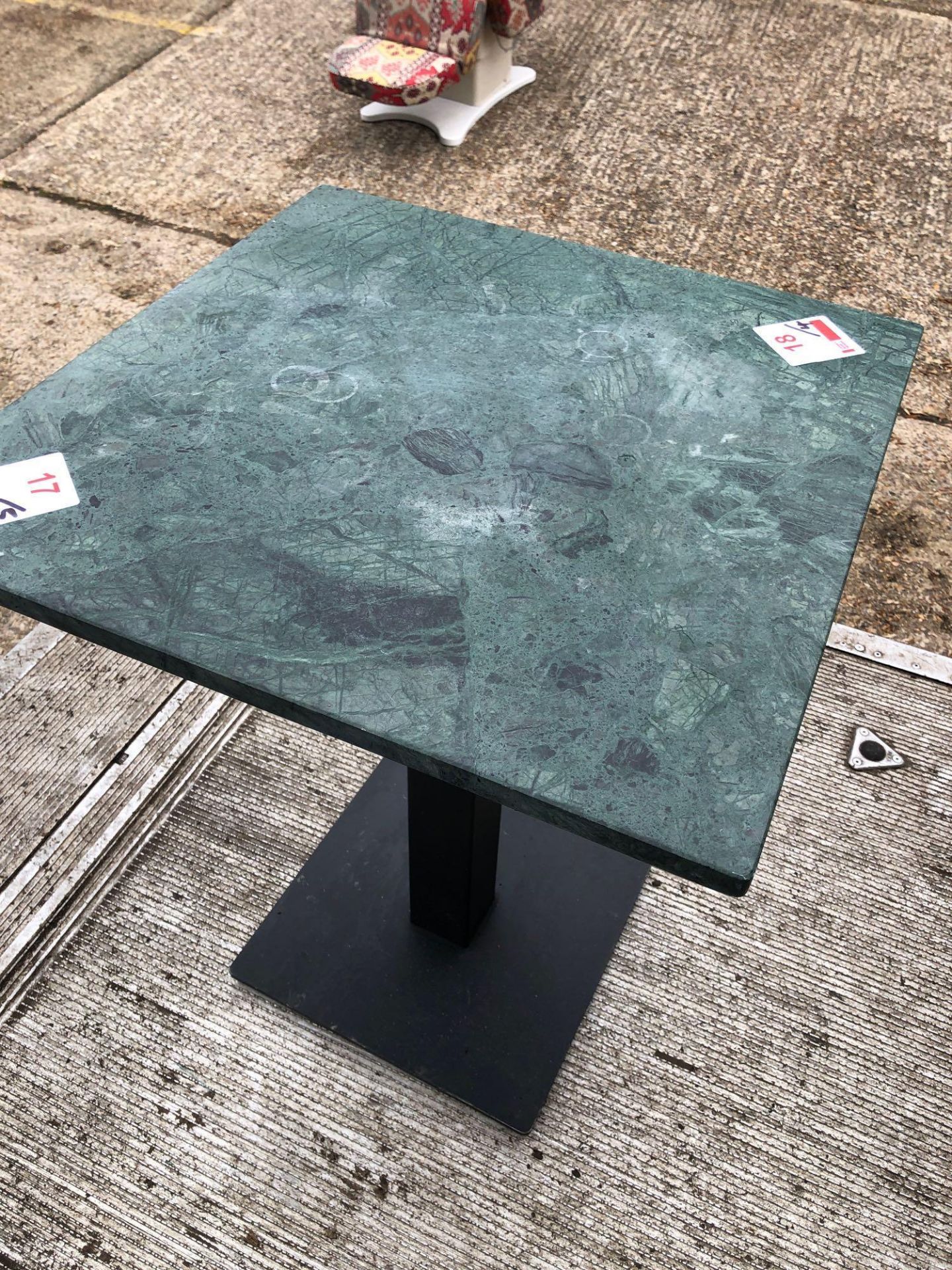 Four 600mm square marble top single pedestal tables