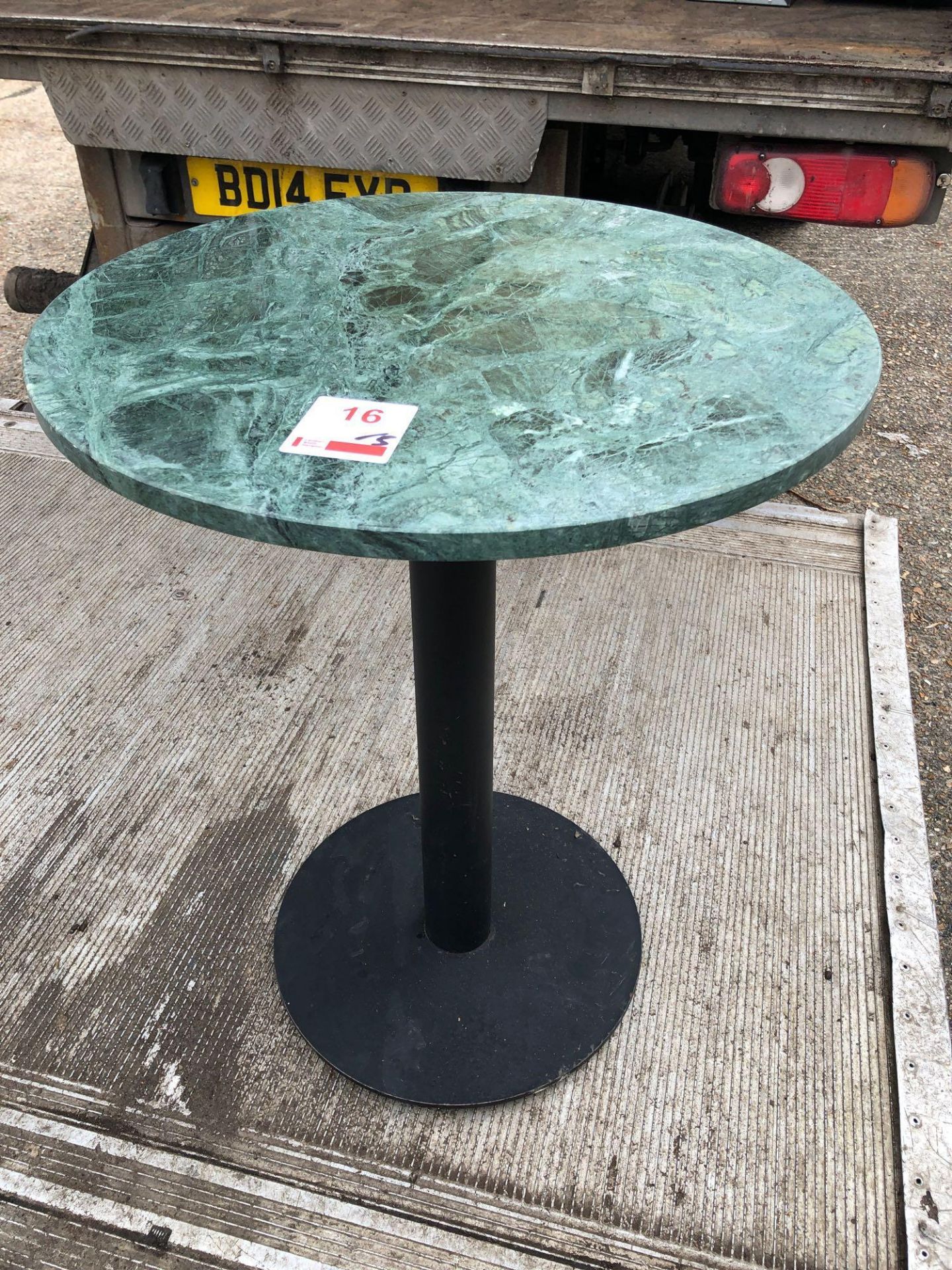 Five 600mm diameter marble top single pedestal tables