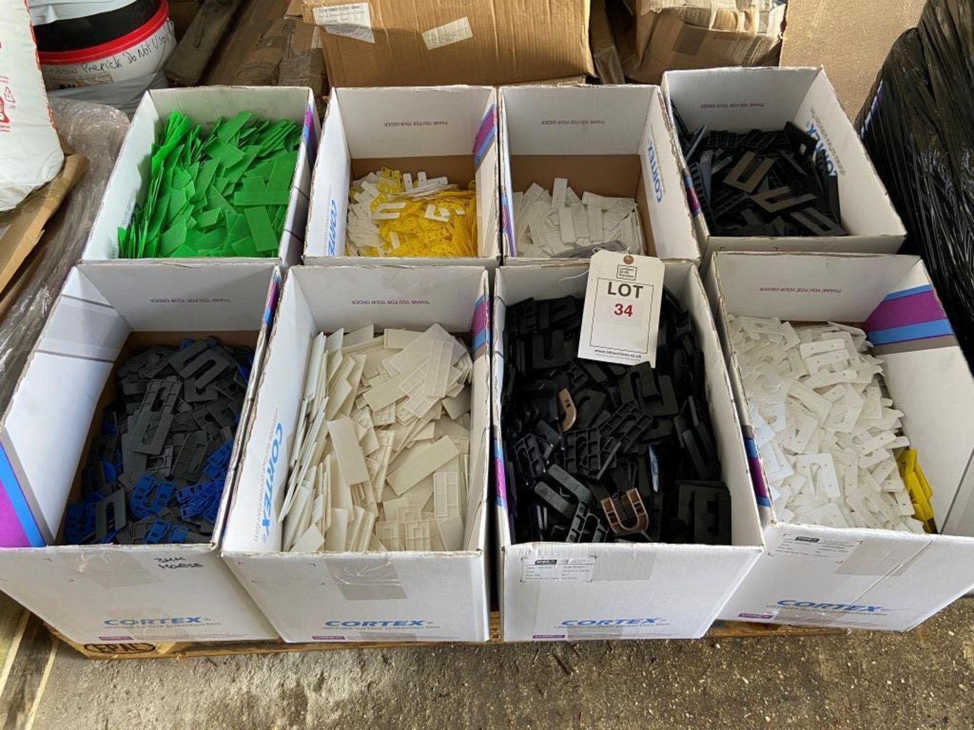 A quantity of various size plastic spacers and fillers 2x pallets