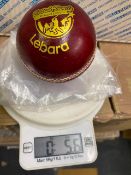 Thirty six Lebara red 5.5oz cricket balls branded with British Tamile cricket league