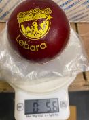 Seventy two Lebara red 5.5oz cricket balls branded with British Tamile cricket league