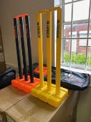 Six yellow/blue and Nine black/orange plastic sets of stumps & bails only c/w carry cases