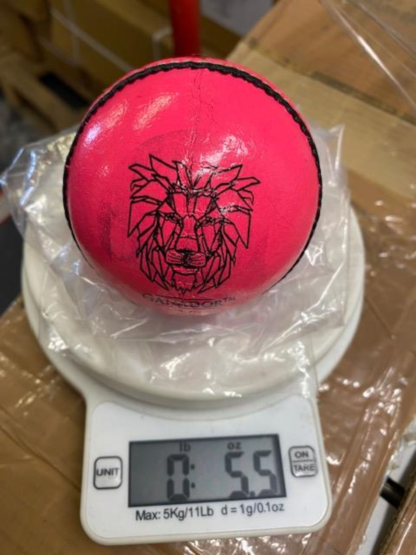 Six pink Ganador cricket balls 5.5oz