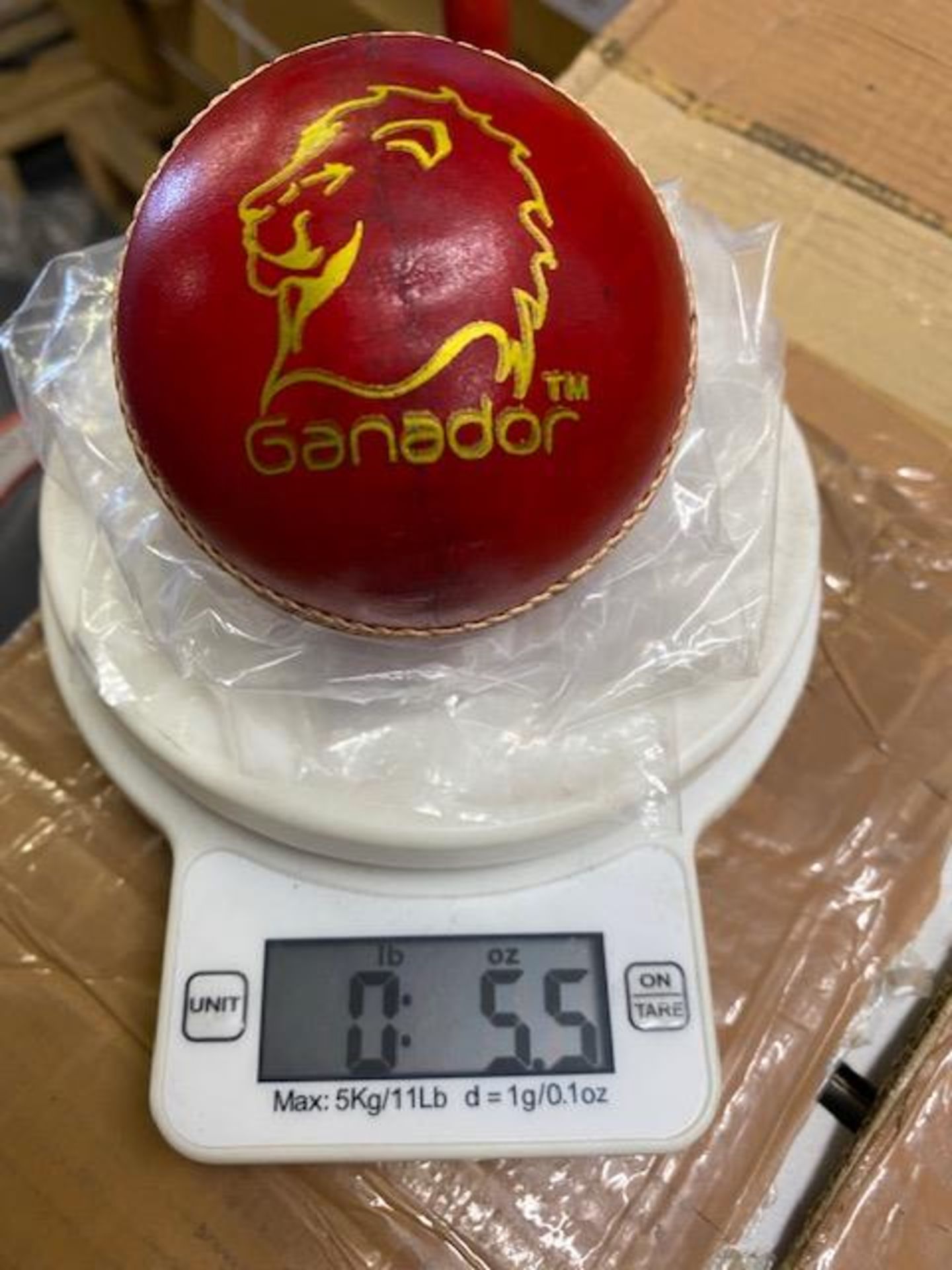 Sixteen red Ganador cricket balls 5.5oz