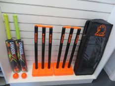Six Ganador black/orange plastic cricket sets each comprising 12 Ganador size 5 plastic cricket