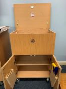 A wooden tool cabinet on wheels with lockable top lid and 2 door storage 83cm H x 60cm W x 40cm D