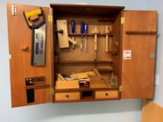 Wall mounted wood tool store with doors c/w qty of tools as lotted 75cm x 57 cm x 20cm D