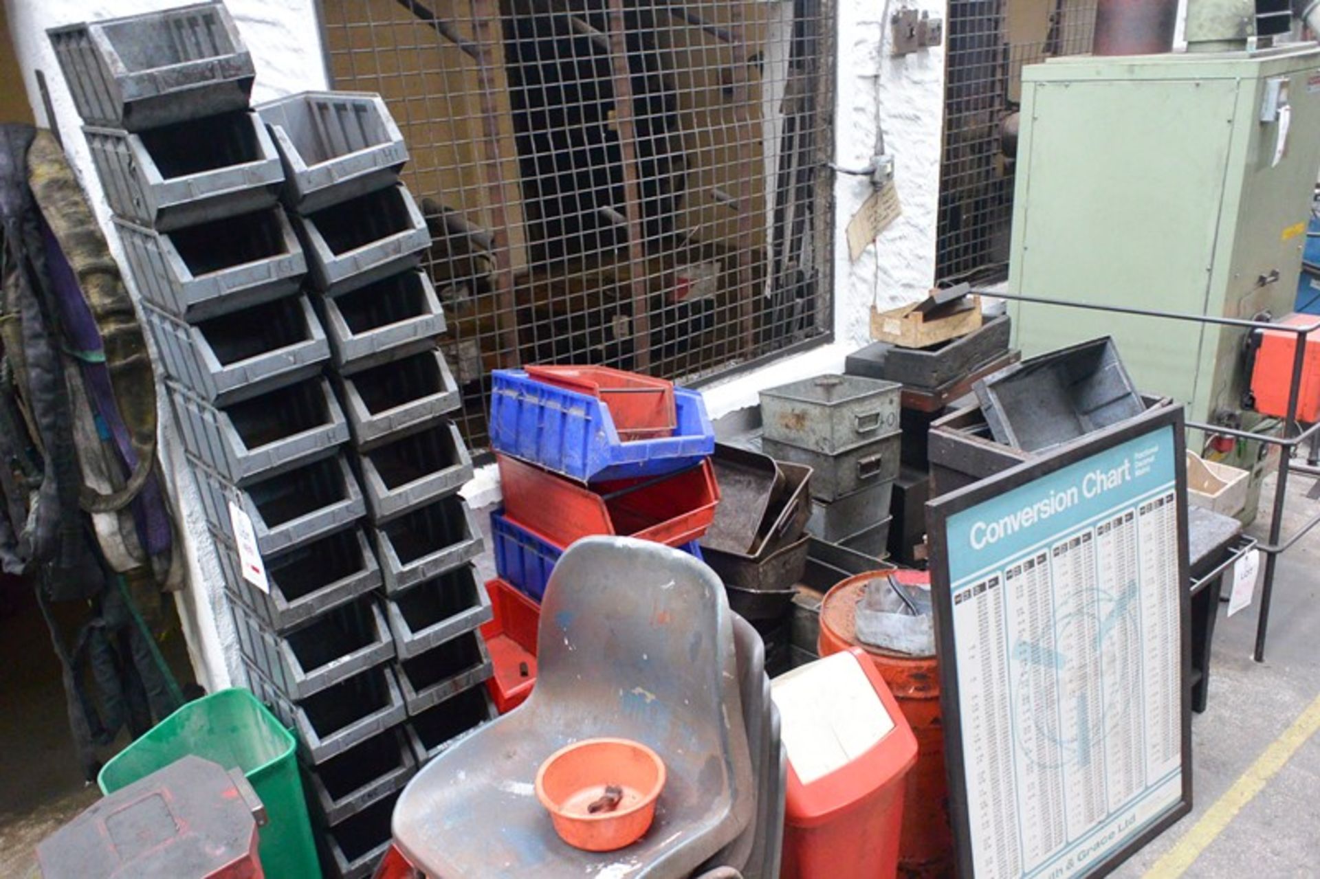 Quantity of plastic tote bins, metal storage drawers, timber cases, drawers, stacking chairs,