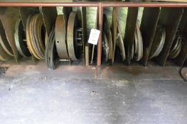 Steel rack and contents to incl. various face plates, belts, steel stock, etc. (Recommended