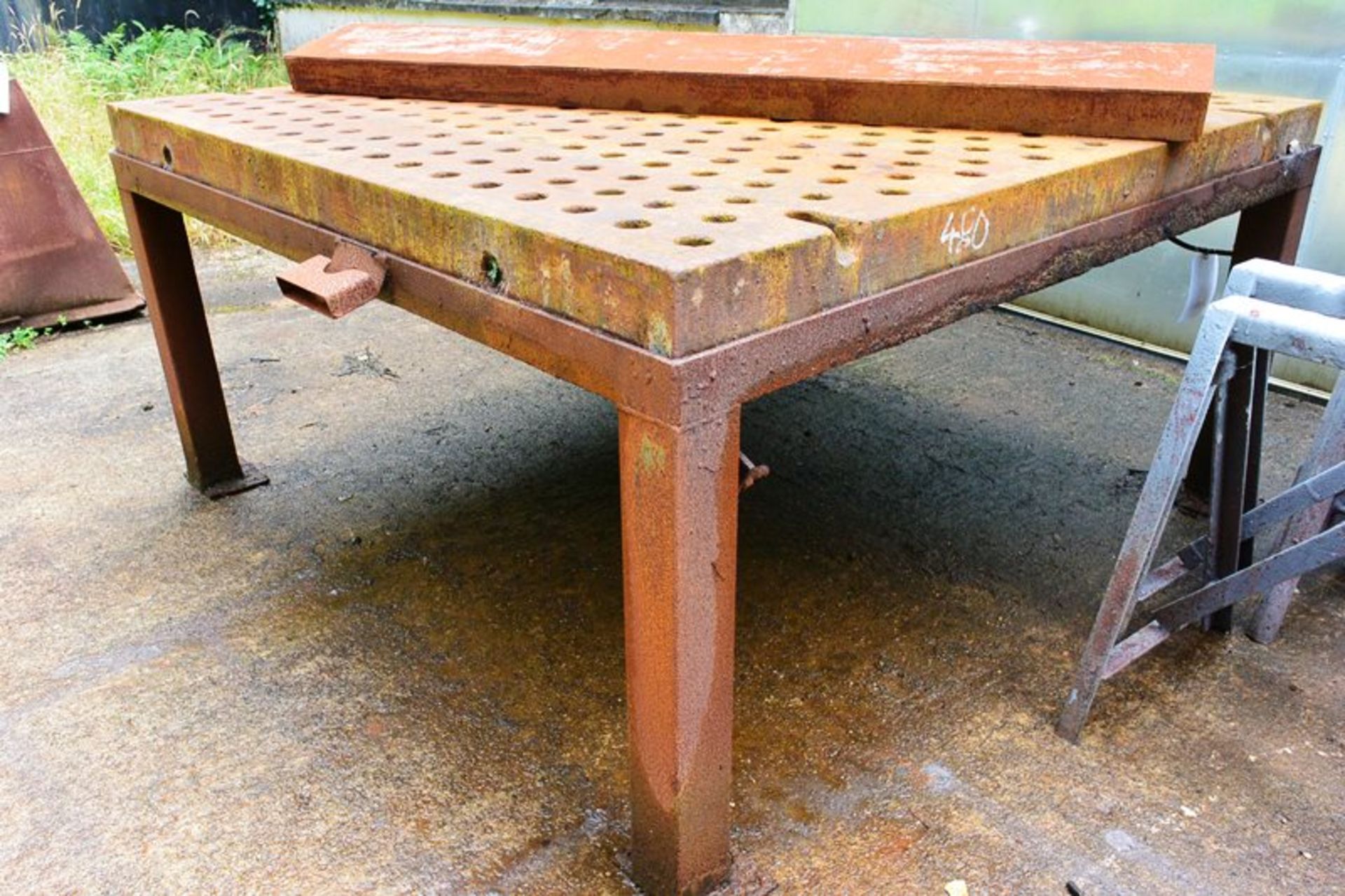 Steel table, approx 2 x 2m, mounted on frame (Recommended collection period for this lot Wednesday
