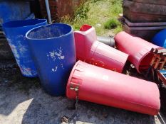 Four waste chutes and four plastic bucket type waste bins