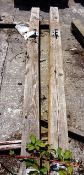Two timber framed gate posts, approx. 2950mm