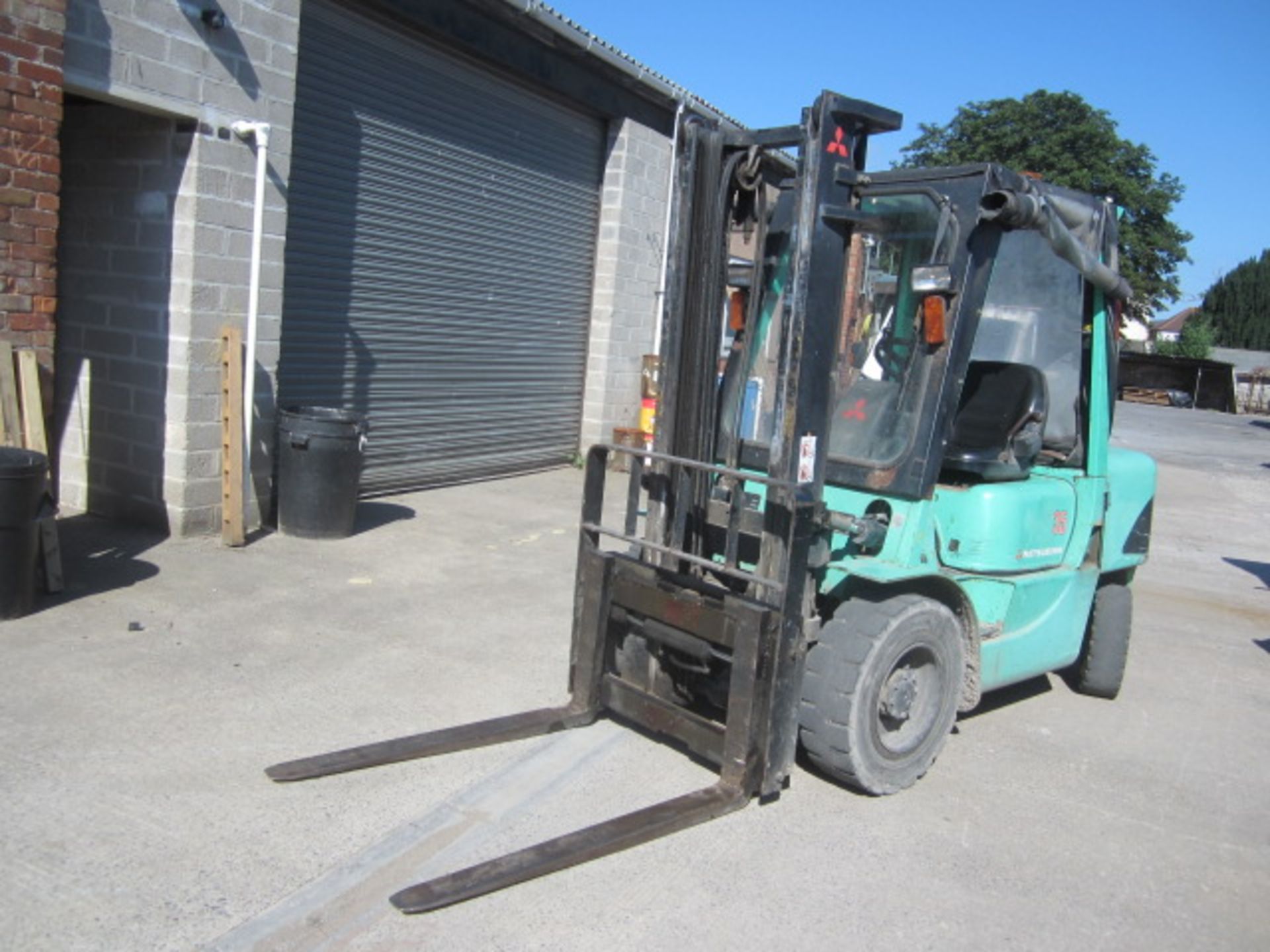 Mitsubishi 35 diesel powered duplex mast forklift truck, with side shift and all weather canopy,