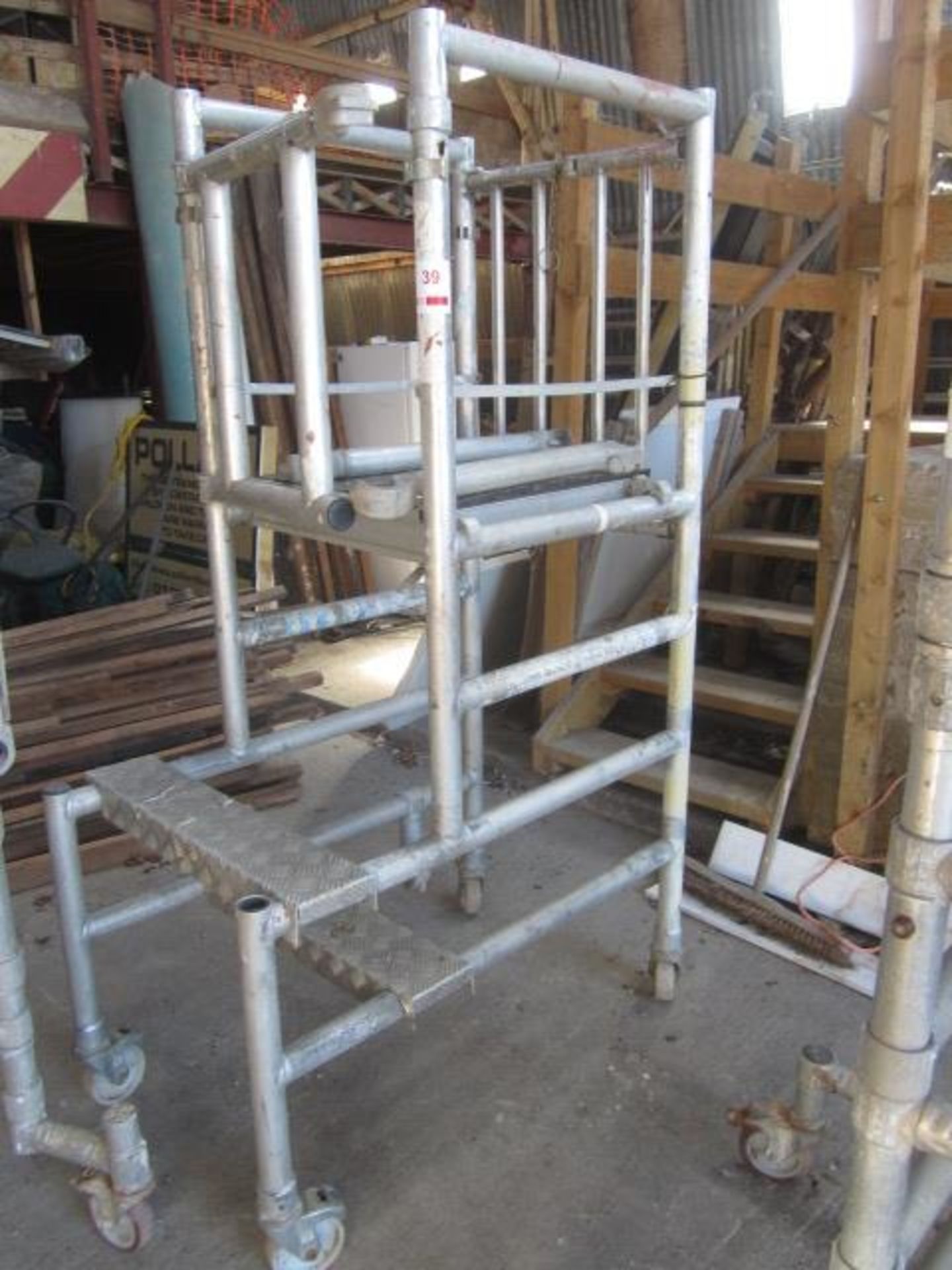 Un-named aluminium framed mobile portable scaffold tower, 650 x 700mm