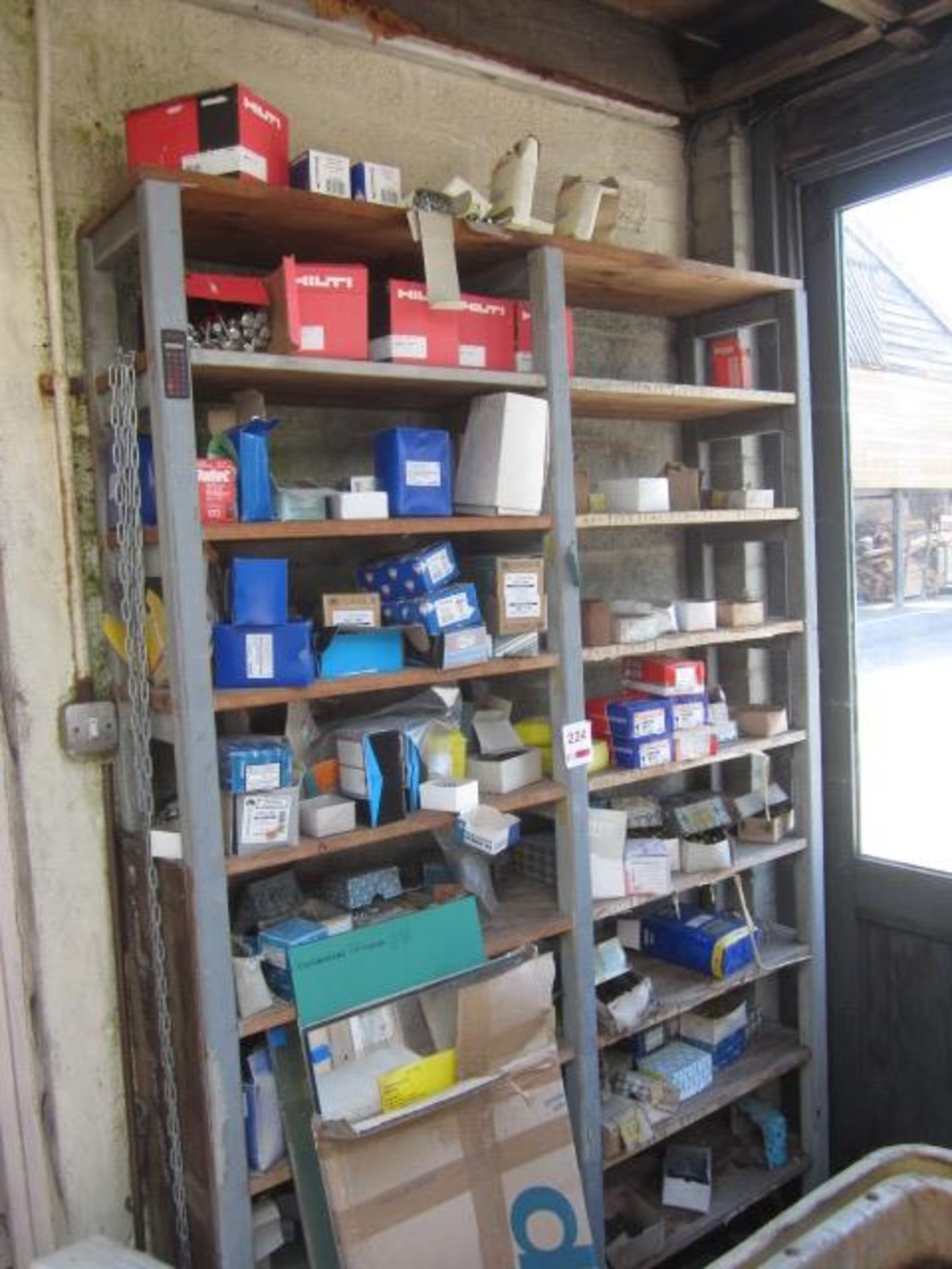 Contents of rack to include wood screws, masonry nails, Hilti bolts, three 4mm mirror with drill