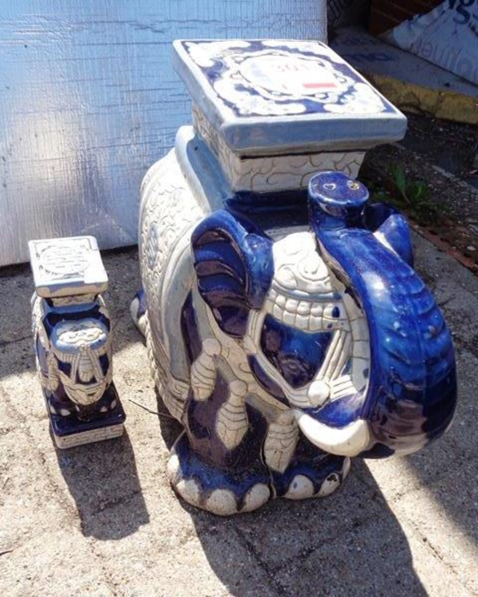 Two ornamental garden elephants