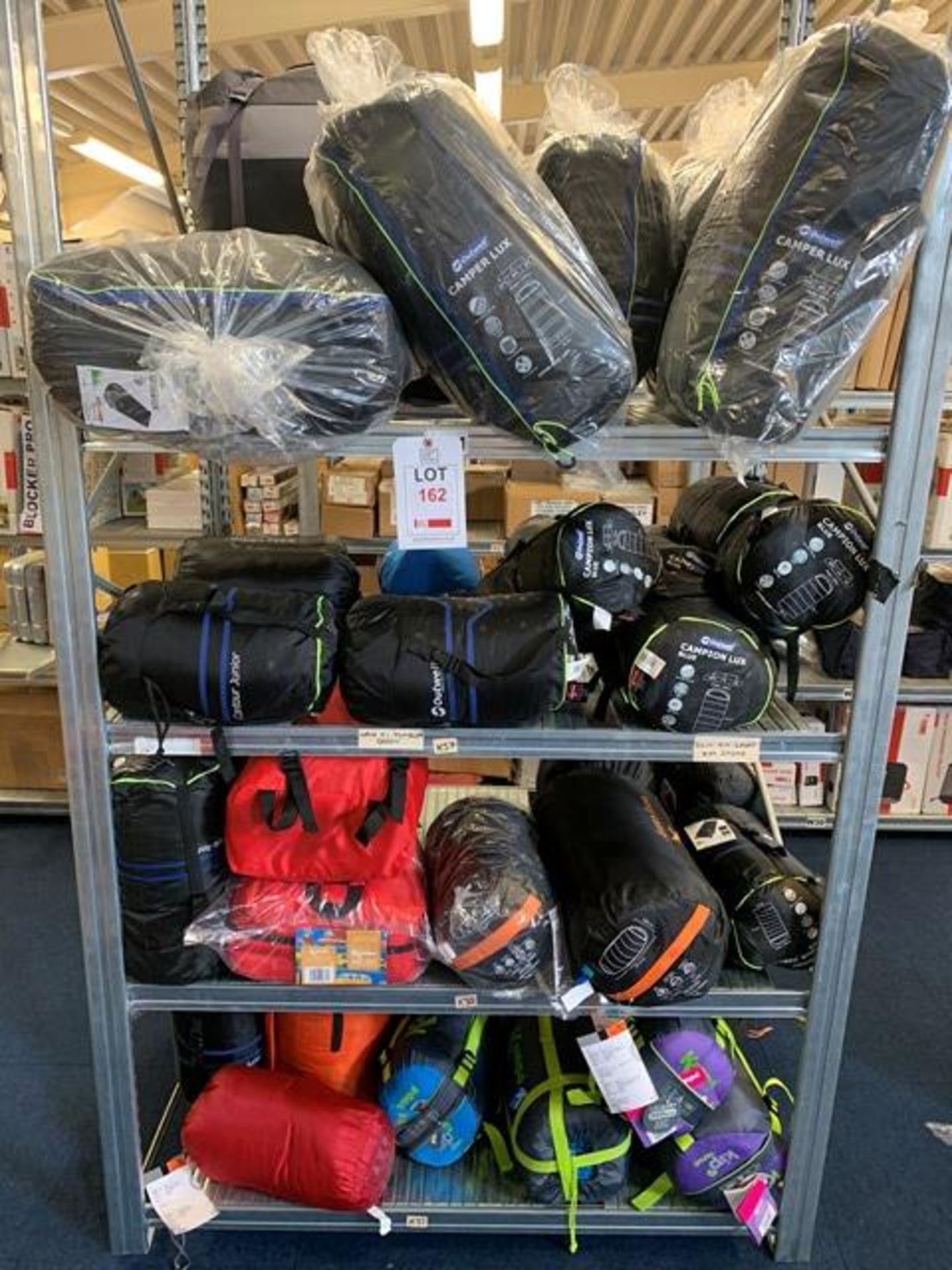 Rack & Contents to include approx 45 unused Outwell, Vango & Kampa Sleeping Bags as lotted