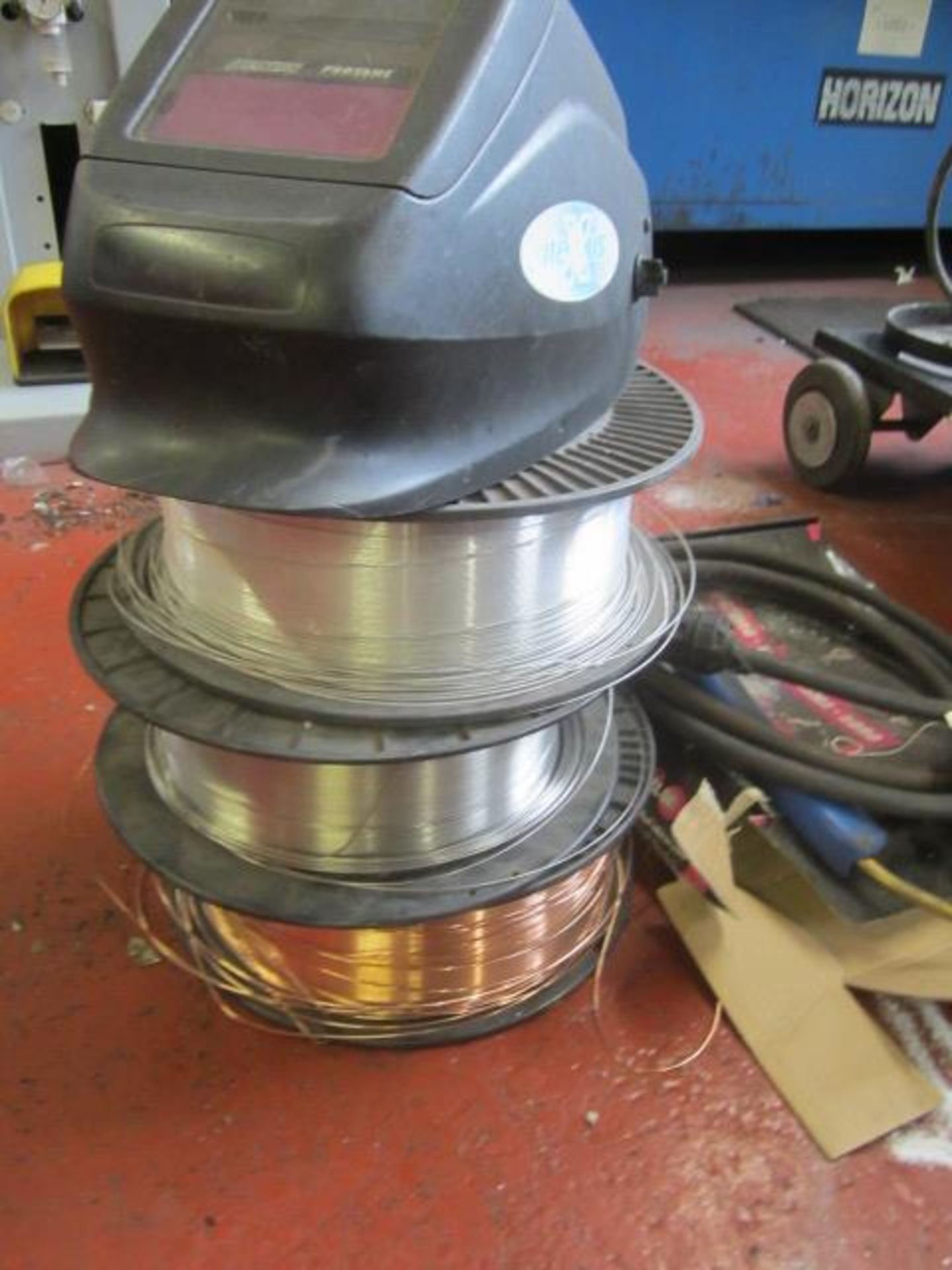 Quantity of assorted welding wire as lotted, welders mask & gun - Image 2 of 4