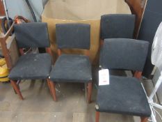 Four black cloth upholstered meeting chairs