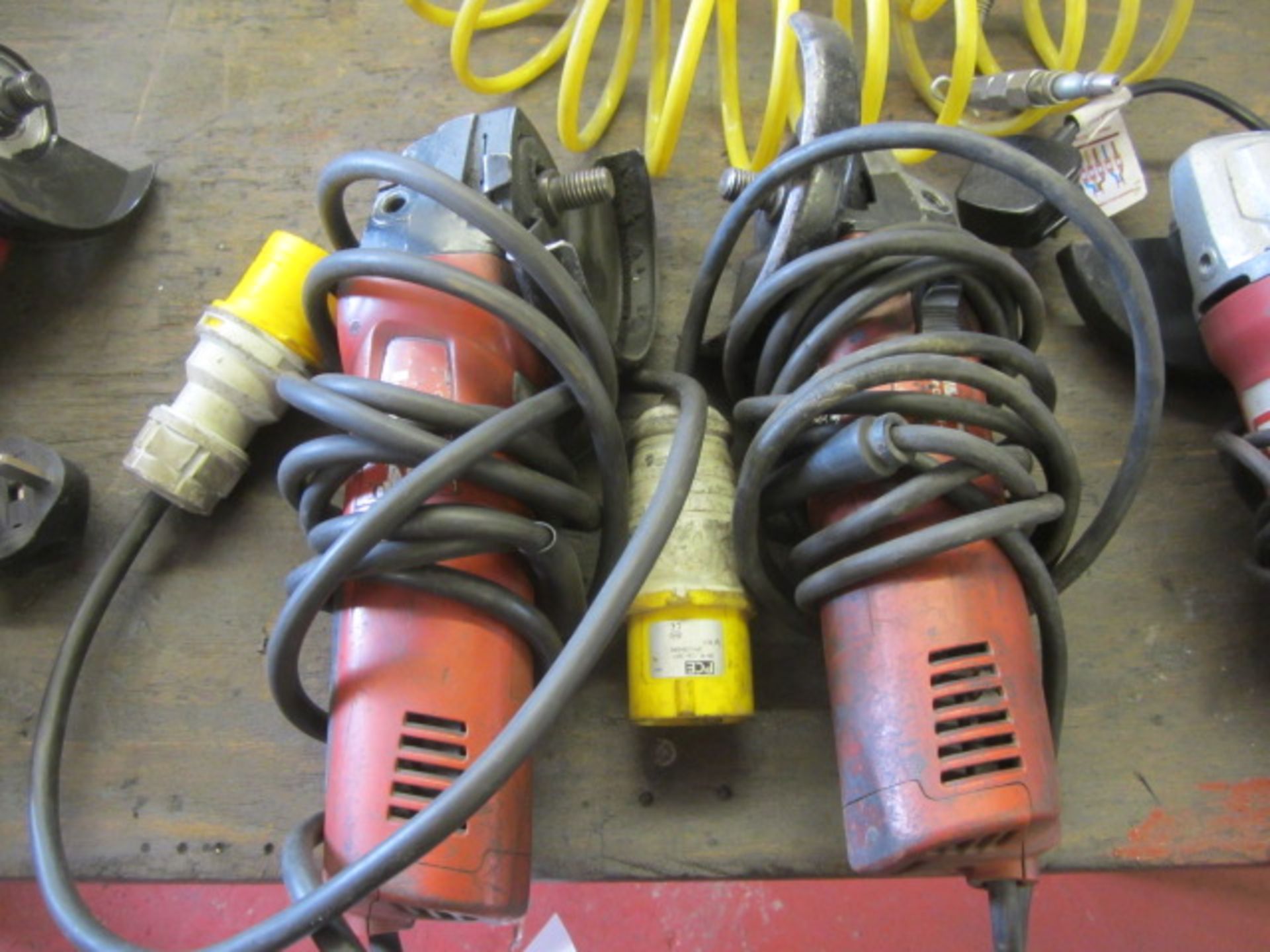 Two Hilti DAG-1255, 110v angle grinders