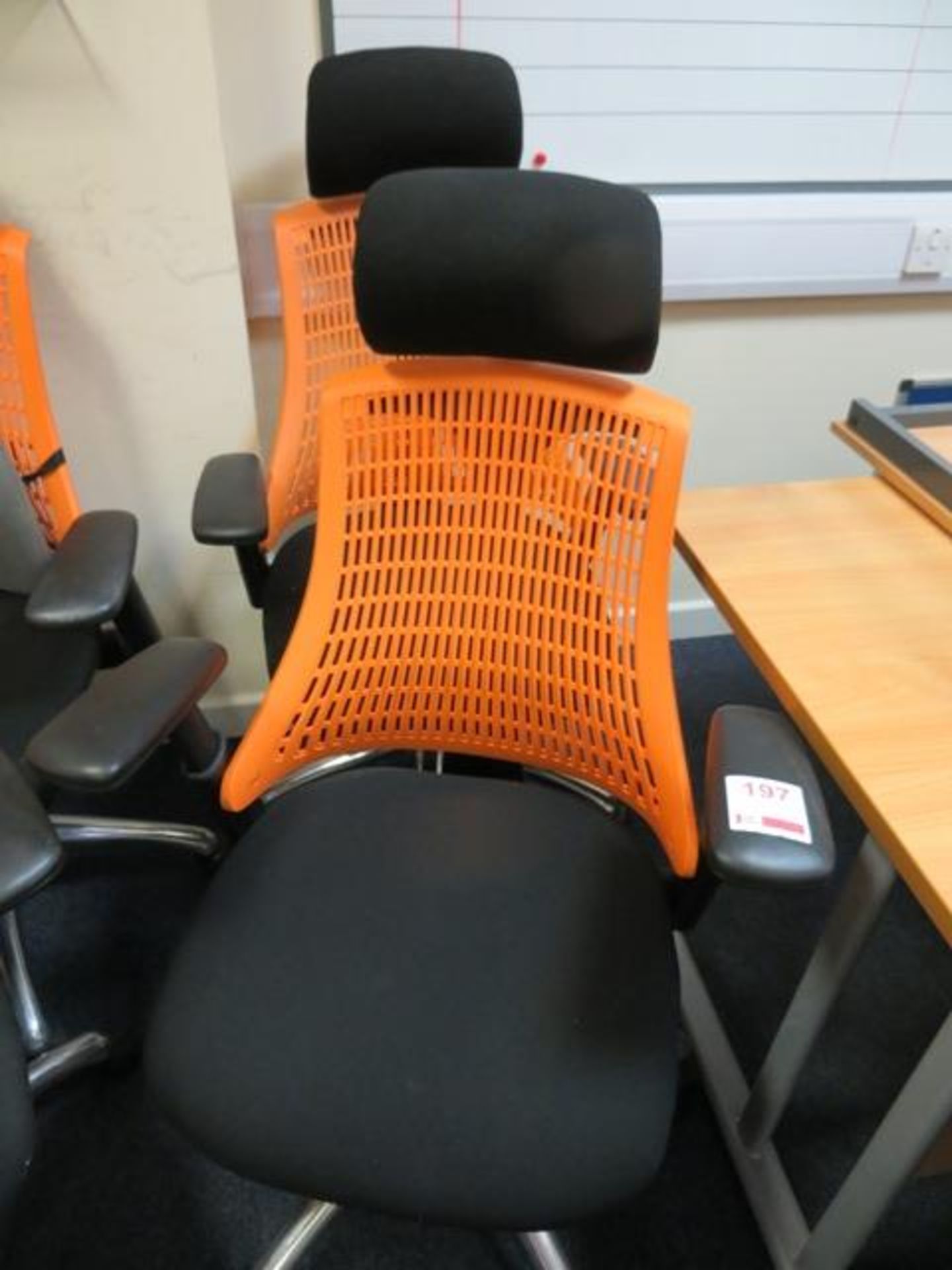 Two Flash ergonomic task office chairs, charcoal seat, orange back* This lot is located at Unit