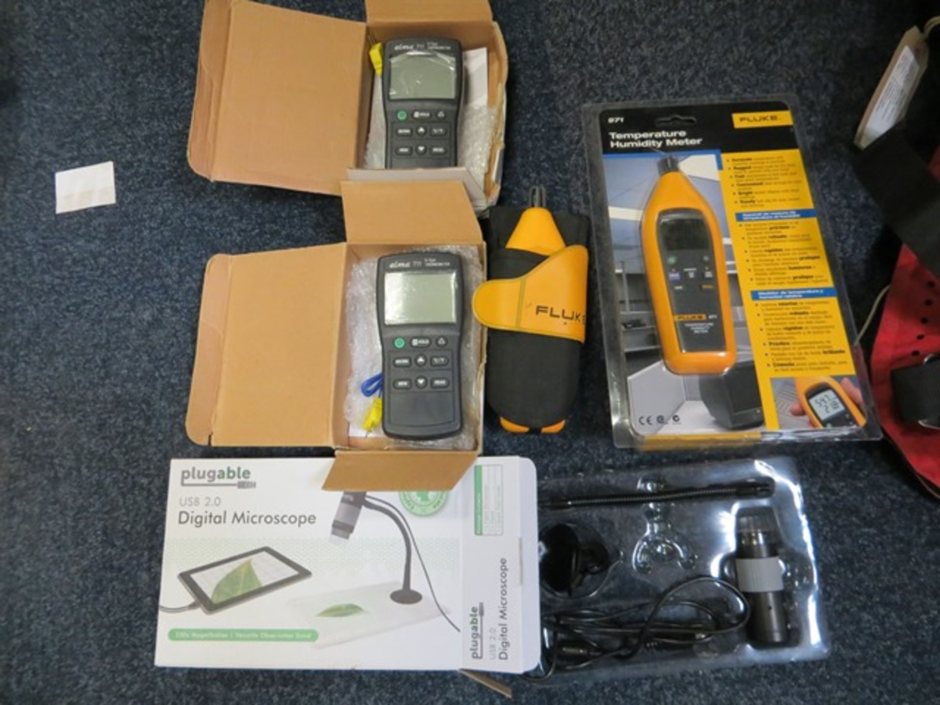 Various meters to include two Fluke 971 Temperature Humidity Meter, Two Elma 711 K-Type