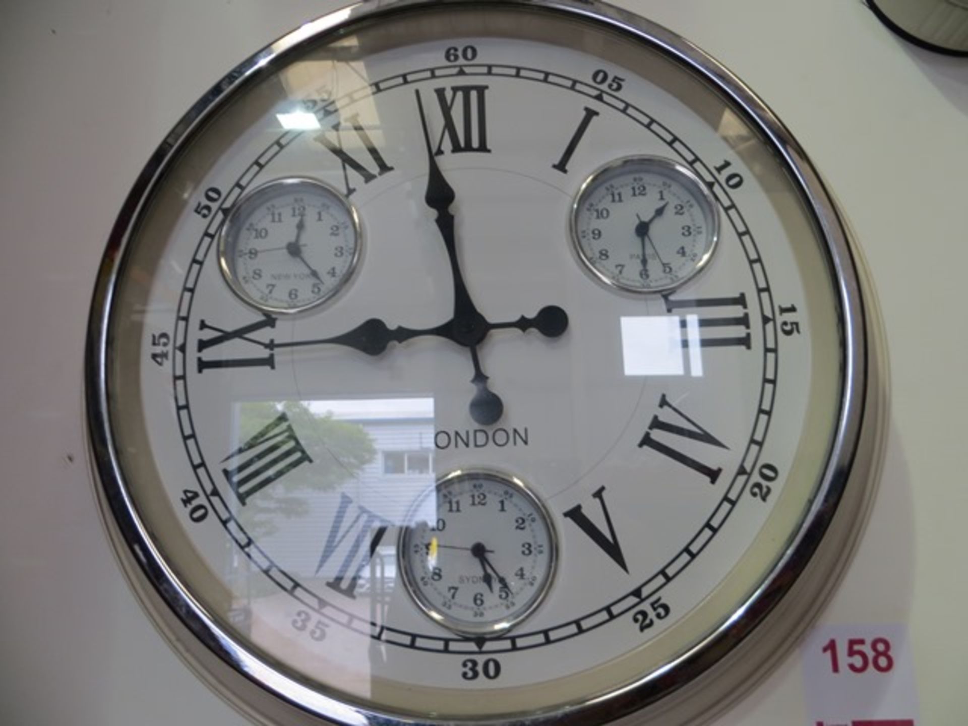 London Wall Clock with New York, Sydney & Paris Inner Clocks* This lot is located at Unit 15,