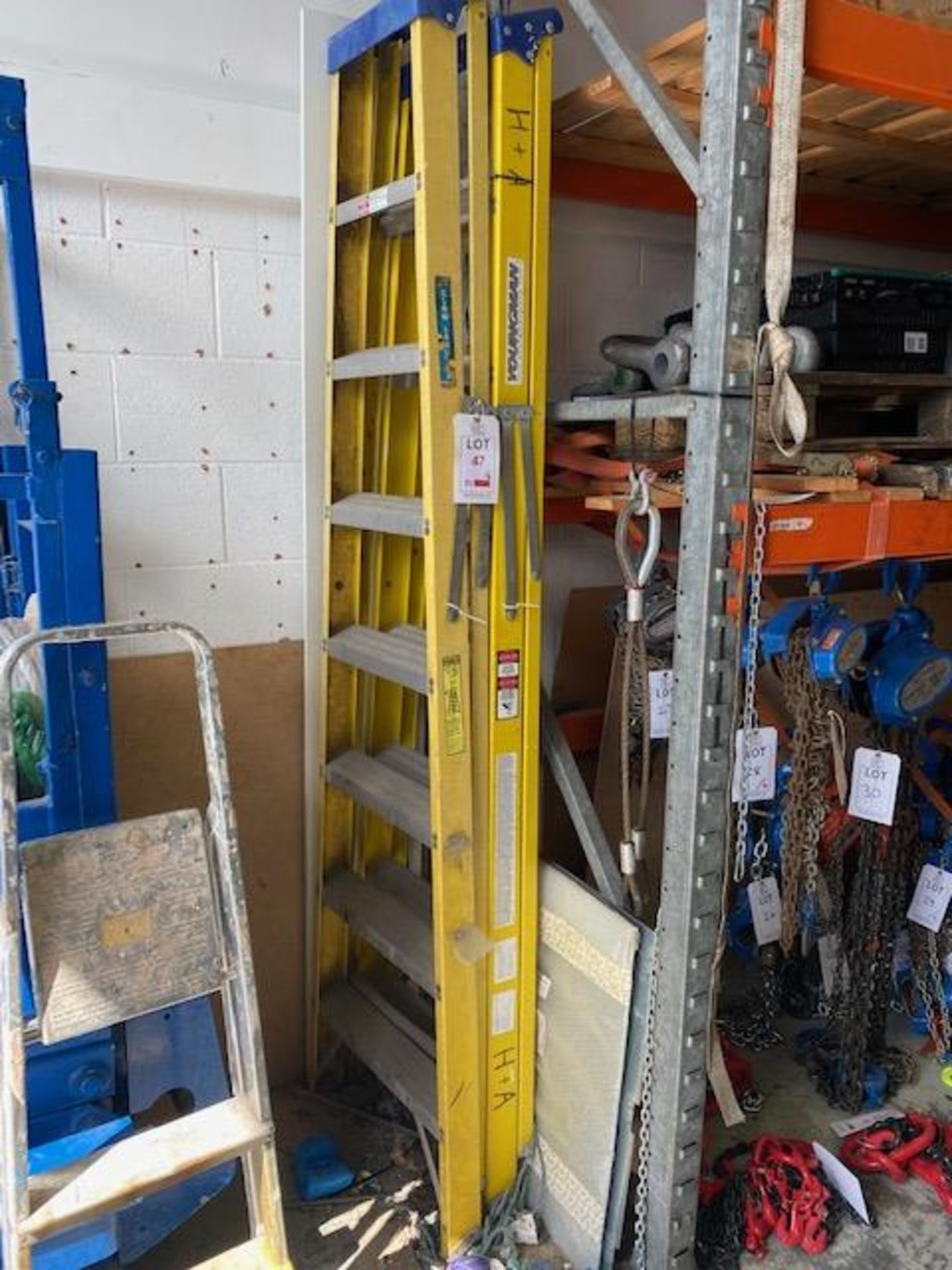 Two Youngman Fibreglass 'A' frame 8 tread ladders and a 4 tread Ali 'A' frame ladder * This lot is