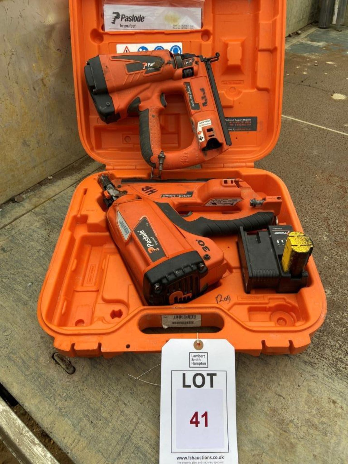 Two Paslode Impulse IM350+ nail guns, one battery and case